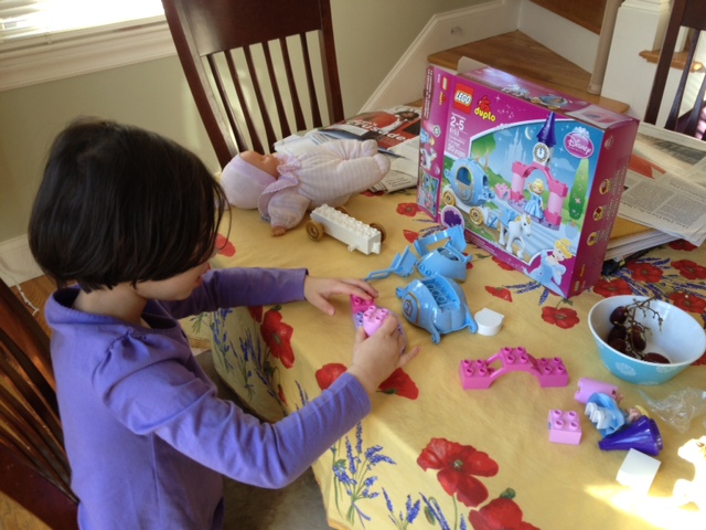 Ayelet building her Lego Friends Cinderella set