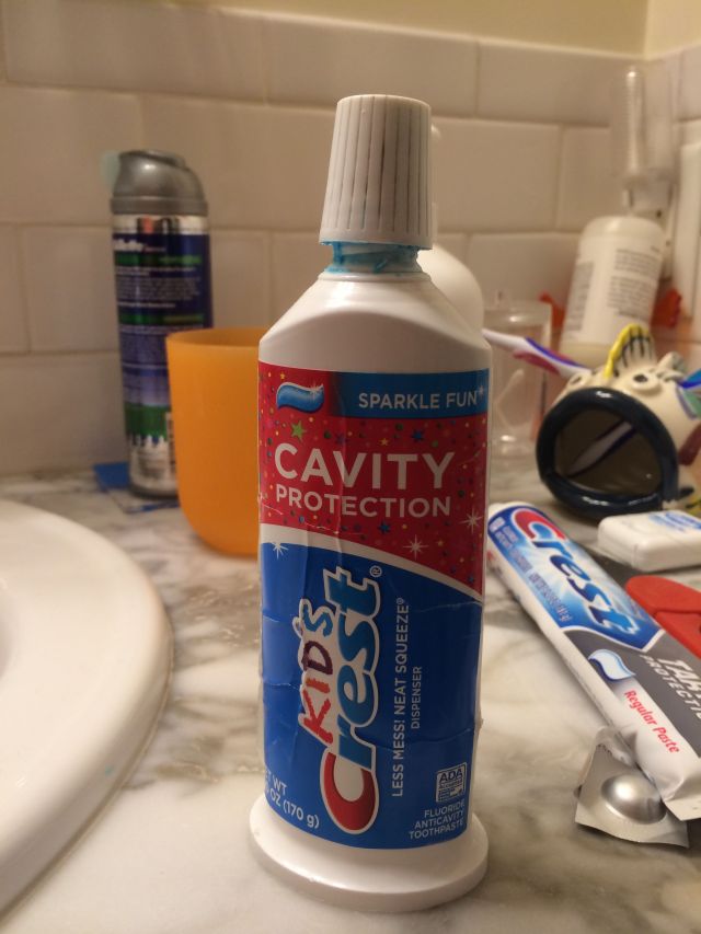 The "Neat Squeeze" bottle always stands straight up on the counter and claims to reduce mess