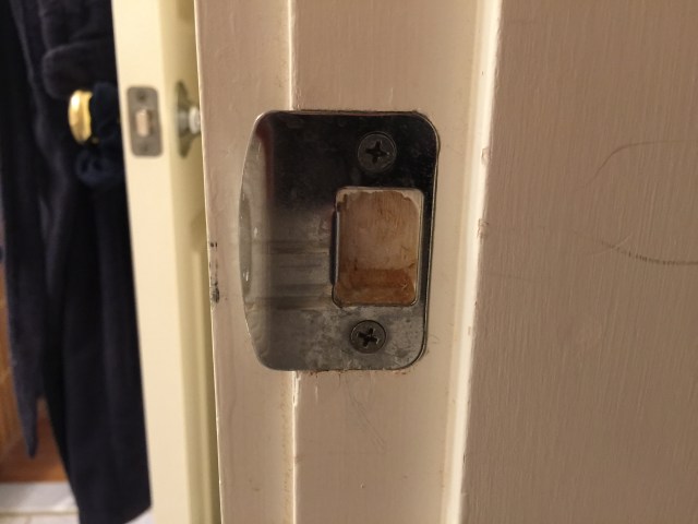 The hole in the strike plate needed to be expanded just a little bit further down.